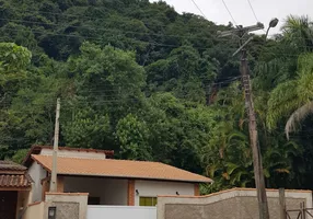 Foto 1 de Casa de Condomínio com 2 Quartos à venda, 123m² em Balneário Praia do Pernambuco, Guarujá