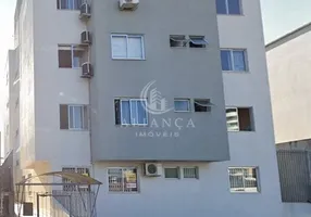 Foto 1 de Apartamento com 2 Quartos à venda, 59m² em Barreiros, São José