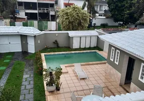 Foto 1 de Casa de Condomínio com 5 Quartos à venda, 475m² em Barra da Tijuca, Rio de Janeiro