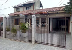 Foto 1 de Casa com 2 Quartos à venda, 170m² em Vila Nova, Porto Alegre