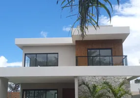 Foto 1 de Casa de Condomínio com 4 Quartos à venda, 242m² em Guarajuba, Camaçari