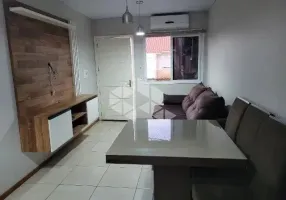 Foto 1 de Casa de Condomínio com 2 Quartos à venda, 67m² em Formoza, Alvorada