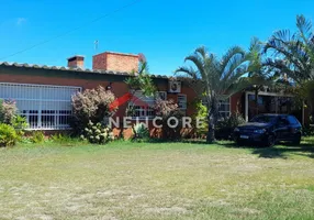 Foto 1 de Casa com 3 Quartos à venda, 138m² em Zona Nova Sul, Tramandaí