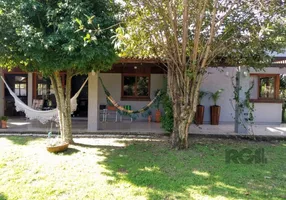 Foto 1 de Casa de Condomínio com 3 Quartos à venda, 219m² em Águas Claras, Viamão