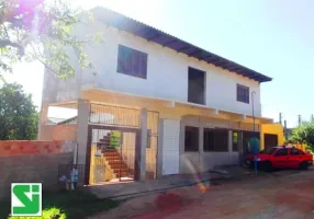 Foto 1 de Casa com 2 Quartos para alugar, 74m² em Camaquã, Porto Alegre