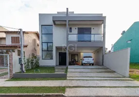 Foto 1 de Casa de Condomínio com 3 Quartos à venda, 186m² em Mário Quintana, Porto Alegre