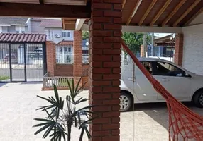 Foto 1 de Casa com 3 Quartos à venda, 80m² em Guajuviras, Canoas