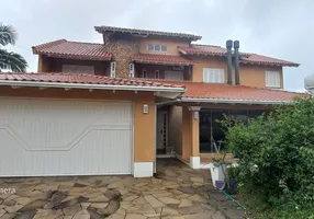 Foto 1 de Casa com 4 Quartos à venda, 331m² em Vila Parque Brasilia, Cachoeirinha
