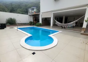 Foto 1 de Casa com 5 Quartos à venda, 409m² em Praia da Costa, Vila Velha