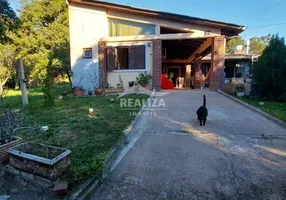 Foto 1 de Casa com 3 Quartos à venda, 150m² em Tarumã, Viamão