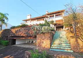 Foto 1 de Casa com 4 Quartos à venda, 610m² em Teresópolis, Porto Alegre