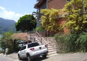 Foto 1 de Casa de Condomínio com 4 Quartos à venda, 240m² em Marinas, Angra dos Reis