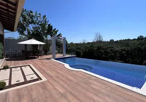 Foto 1 de Casa de Condomínio com 5 Quartos à venda, 320m² em Manguinhos, Serra