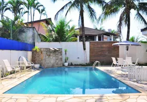Foto 1 de Casa com 4 Quartos à venda, 350m² em Jardim Acapulco , Guarujá