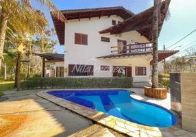 Foto 1 de Casa de Condomínio com 4 Quartos à venda, 274m² em Loteamento Costa do Sol, Bertioga