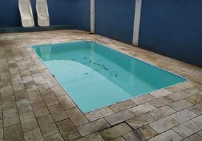 Foto 1 de Sobrado com 4 Quartos à venda, 300m² em Mirim, Praia Grande