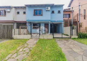 Foto 1 de Casa com 3 Quartos à venda, 136m² em Santa Fé, Porto Alegre