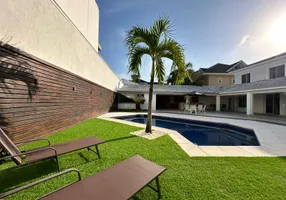 Foto 1 de Casa com 5 Quartos para venda ou aluguel, 550m² em Barra da Tijuca, Rio de Janeiro