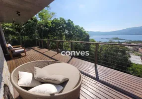 Foto 1 de Casa de Condomínio com 2 Quartos à venda, 101m² em Praia da Ferrugem, Garopaba