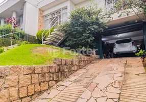 Foto 1 de Casa com 3 Quartos à venda, 227m² em Três Figueiras, Porto Alegre