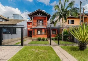 Foto 1 de Casa com 3 Quartos à venda, 210m² em Santa Fé, Porto Alegre