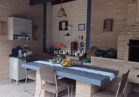 Foto 1 de Casa com 4 Quartos à venda, 206m² em Jardim Porto Novo, Caraguatatuba