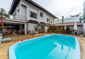 Foto 1 de Casa com 4 Quartos à venda, 300m² em Jardim Lindóia, Porto Alegre