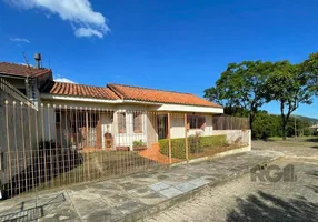 Foto 1 de Casa com 2 Quartos à venda, 146m² em Vila Nova, Porto Alegre