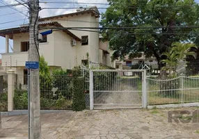 Foto 1 de Casa de Condomínio com 4 Quartos à venda, 167m² em Medianeira, Porto Alegre