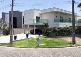 Foto 1 de Casa de Condomínio com 5 Quartos à venda, 422m² em Alphaville Eusebio, Eusébio