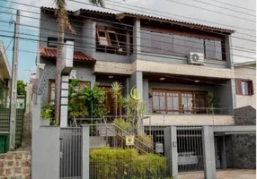Foto 1 de Casa com 5 Quartos para venda ou aluguel, 550m² em Vila Ipiranga, Porto Alegre