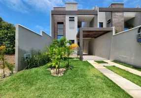 Foto 1 de Casa de Condomínio com 4 Quartos à venda, 128m² em Centro, Aquiraz