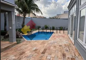 Foto 1 de Casa de Condomínio com 4 Quartos para venda ou aluguel, 302m² em Loteamento Alphaville Campinas, Campinas