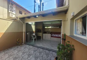 Foto 1 de Casa de Condomínio com 3 Quartos à venda, 98m² em Harmonia, Canoas