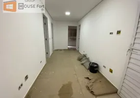 Foto 1 de Casa de Condomínio com 2 Quartos à venda, 57m² em Jardim Trevo, Praia Grande