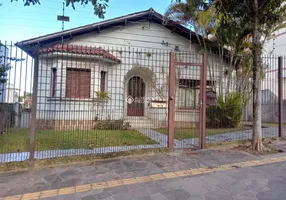 Foto 1 de Casa com 4 Quartos à venda, 330m² em Santo Antônio, Porto Alegre