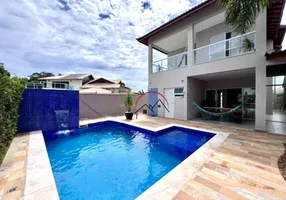 Foto 1 de Casa de Condomínio com 3 Quartos à venda, 210m² em Jardim Marcia I, Peruíbe