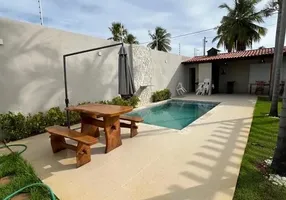 Foto 1 de Sobrado com 4 Quartos à venda, 140m² em Barra do Jacuipe Monte Gordo, Camaçari