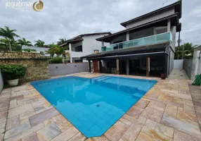 Foto 1 de Casa de Condomínio com 3 Quartos para venda ou aluguel, 300m² em Balneário Praia do Pernambuco, Guarujá