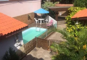 Foto 1 de Sobrado com 4 Quartos à venda, 211m² em Nonoai, Porto Alegre