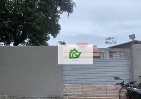 Foto 1 de Casa com 2 Quartos à venda, 85m² em Massaguaçu, Caraguatatuba