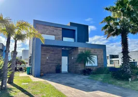 Foto 1 de Casa de Condomínio com 4 Quartos à venda, 230m² em Capao da Canoa, Capão da Canoa