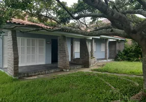 Foto 1 de Casa com 4 Quartos à venda, 410m² em Centro, Tramandaí