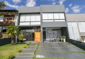 Foto 1 de Casa de Condomínio com 3 Quartos à venda, 270m² em Hípica, Porto Alegre