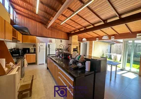 Foto 1 de Casa de Condomínio com 4 Quartos à venda, 150m² em Praia da Baleia, Serra