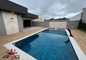 Foto 1 de Casa de Condomínio com 4 Quartos à venda, 222m² em Morada da Praia, Bertioga