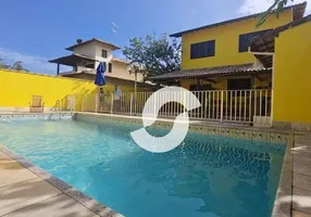 Foto 1 de Casa com 4 Quartos à venda, 252m² em Centro, Maricá