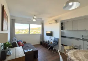 Foto 1 de Apartamento com 2 Quartos à venda, 58m² em Santo Antônio, Porto Alegre