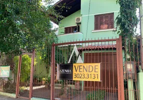 Foto 1 de Sobrado com 4 Quartos à venda, 278m² em Rio Branco, Porto Alegre