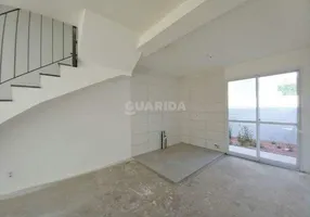 Foto 1 de Casa de Condomínio com 2 Quartos para alugar, 87m² em Vila Nova, Porto Alegre